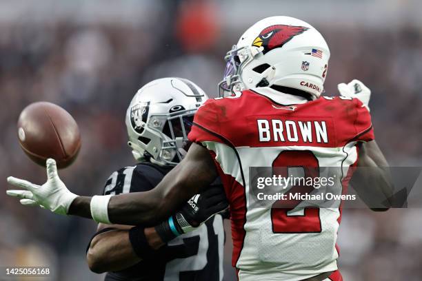 Marquise Brown of the Arizona Cardinals completes a one-handed catch against Amik Robertson of the Las Vegas Raiders during the second half at...