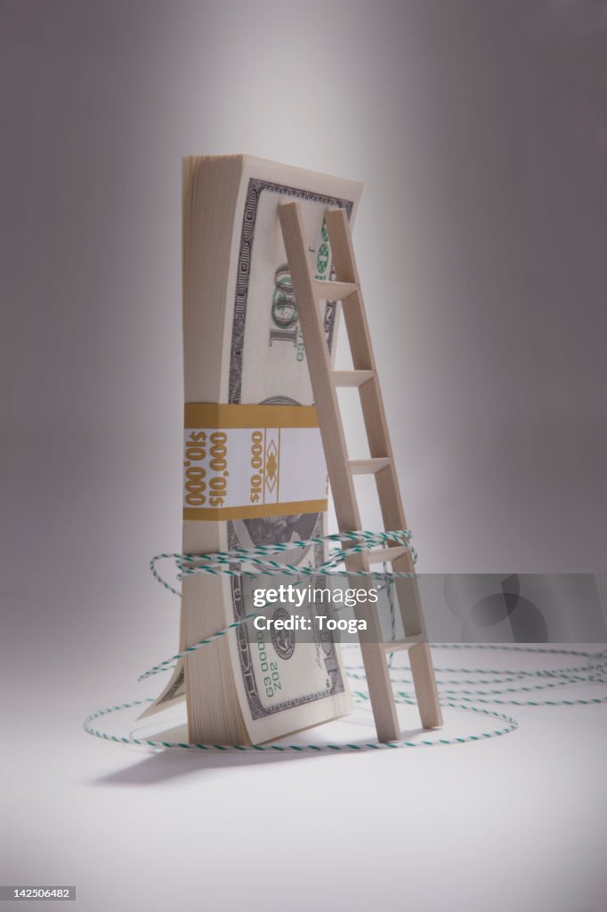 Stack Money With Ladder And String High-Res Stock Photo - Getty Images