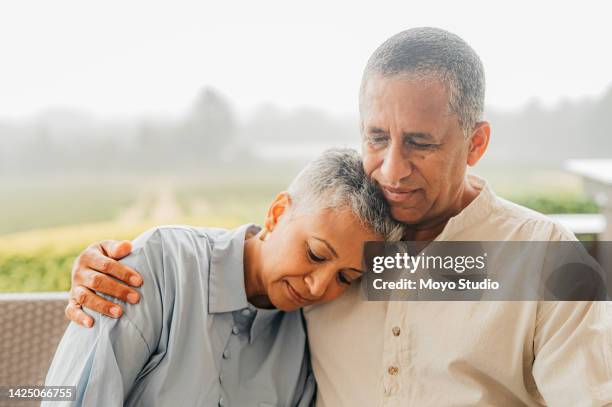 depression, cancer and mental health with an elderly couple having a problem or issue in need of help. sad, love and trust with a senior man and woman sitting outside together in support and comfort - an old mistress stock pictures, royalty-free photos & images