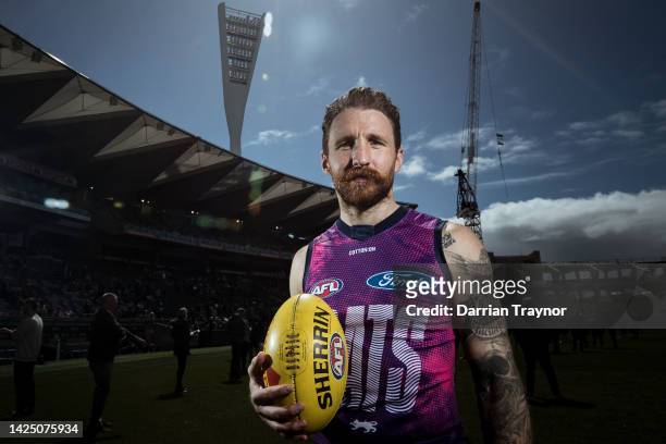 Zach Tuohy of the Cats poses for a photo after a Geelong Cats AFL training session at GMHBA Stadium on September 19, 2022 in Geelong, Australia.