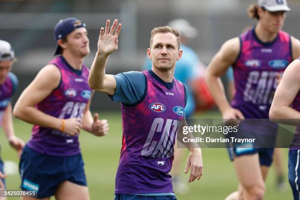 Joel Selwood of the Cats acknowledges the fans during a Geelong Cats AFL training session at GMHBA Stadium on September 19, 2022 in Geelong,...