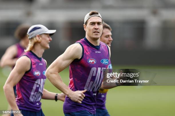 Jeremy Cameron of the Cats warms up before a Geelong Cats AFL training session at GMHBA Stadium on September 19, 2022 in Geelong, Australia.