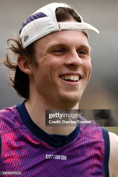 Max Holmes of the Cats runs laps during a Geelong Cats AFL training session at GMHBA Stadium on September 19, 2022 in Geelong, Australia.