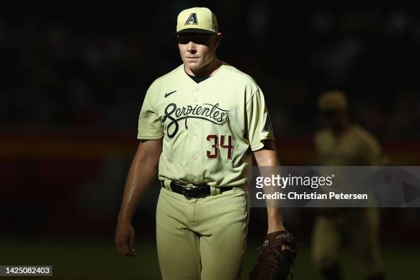 Relief pitcher Mark Melancon of the Arizona Diamondbacks walks to the dugout during the ninth inning of the MLB game against the San Diego Padres at...