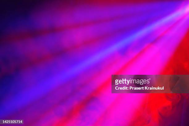 lighting with smoke background.  spotlights and smoke in concert - thailand illumination festival stock pictures, royalty-free photos & images