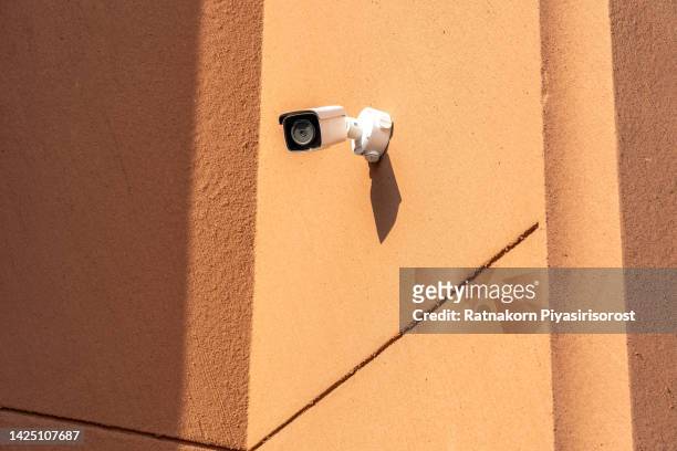 surveillance camera with wall, copy space - alarm system stock pictures, royalty-free photos & images