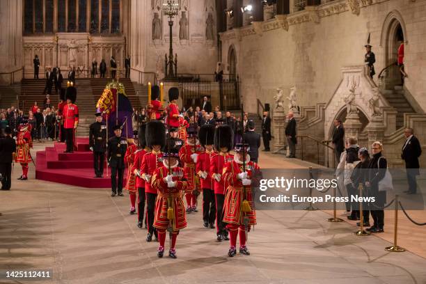 Royal guards stand next to the coffin of Queen Elizabeth II during the last day of her funeral chapel at Westminster Hall, Sept. 19 in London, United...