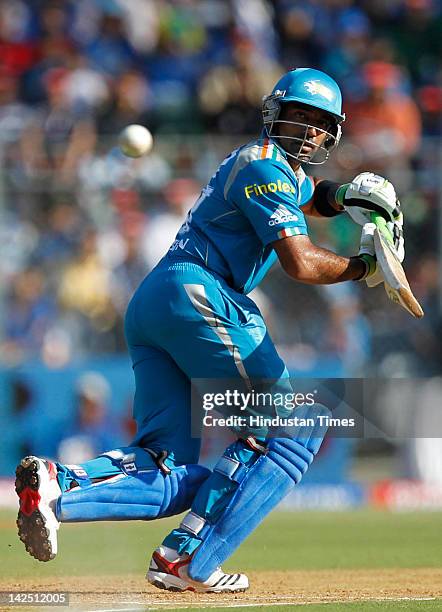 Robin Uthappa of Pune Warriors plays a shot during the IPL 5 match between the Mumbai Indians and Pune Warriors at Wankhede Stadium on April 6, 2012...