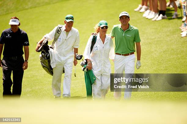 Masters Preview: Phil Mickelson with caddie Tom Buchholz, Keegan Bradley with mother, Kaye, serving as caddie during Par 3 tournament on Wednesday at...