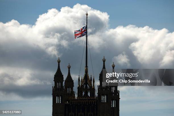 The union flag flies at half-staff above Victoria Tower at the Palace of Westminster in honor of Queen Elizabeth II on September 18, 2022 in London,...