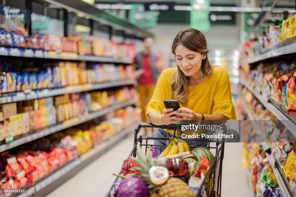Purchasing Goods with Smartphone at Grocery Store