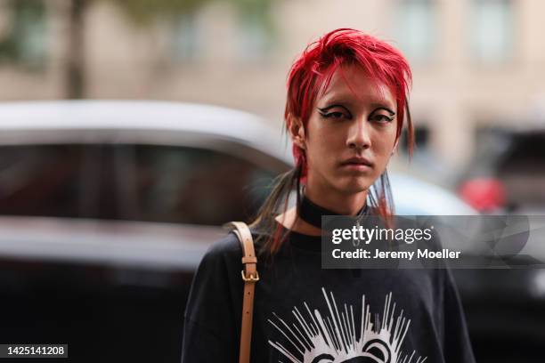 Holland seen wearing an oversize shirt with print outside Coach during New York Fashion Week on September 12, 2022 in New York City.