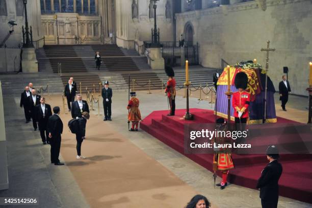 The last person queuing pays her homage to the Queen Elizabeth II lying in state in Westminster Hall on September 19, 2022 in London, United Kingdom....