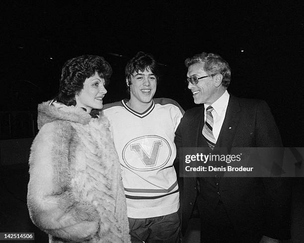 Pat Lafontaine of the Verdun Juniors poses for a photo with his parents before a game at the Verdun Auditorium in Montreal, Quebec, Canada.