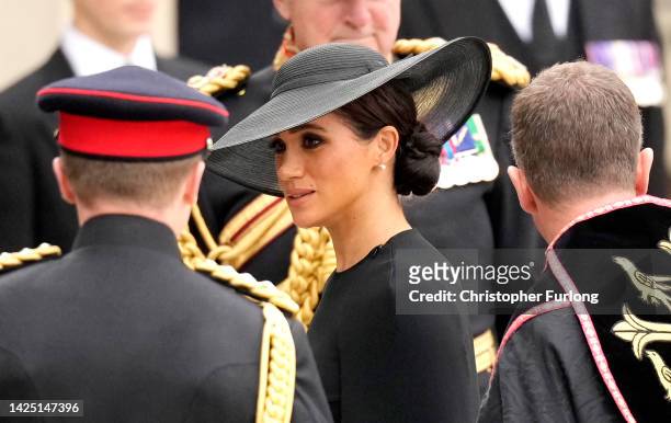Meghan, Duchess of Sussex arrives at Westminster Abbey for The State Funeral of Queen Elizabeth II on September 19, 2022 in London, England....