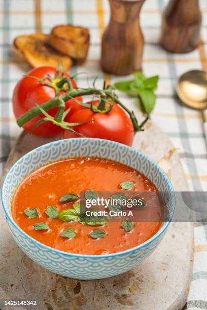 tomato creamy soup in a bowl - tomato soup ストックフォトと画像