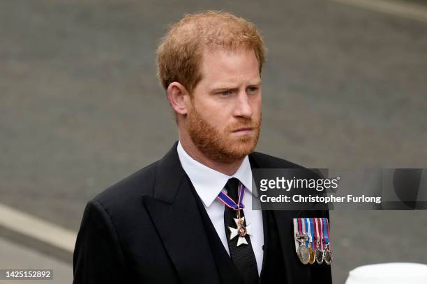 Prince Harry, Duke of Sussex arrive at Westminster Abbey ahead of the State Funeral of Queen Elizabeth II on September 19, 2022 in London, England....