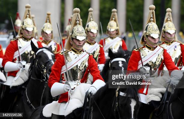 Household Cavalry ahead of the State Funeral of Queen Elizabeth II at Wellington Arch on September 19, 2022 in London, England. Elizabeth Alexandra...