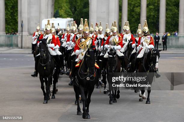 Household Cavalry ahead of the State Funeral of Queen Elizabeth II at Wellington Arch on September 19, 2022 in London, England. Elizabeth Alexandra...