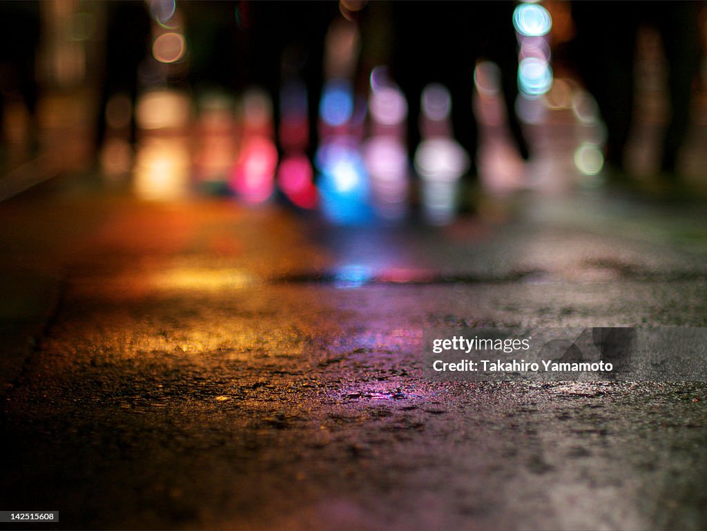 Wet street at night