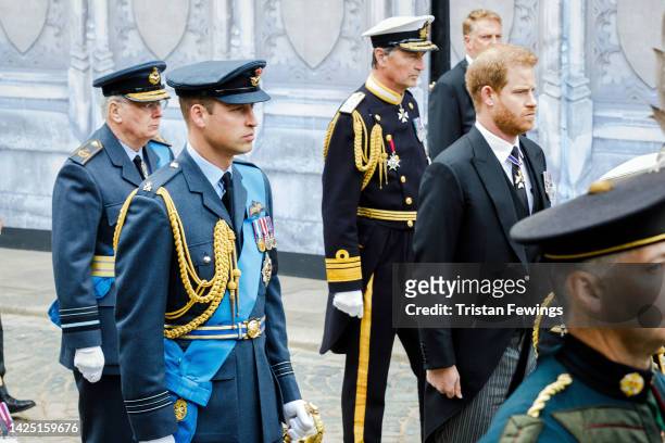 Prince Richard, Duke of Gloucester, Prince William, Prince of Wales, Vice Admiral, Sir Timothy Lawrence and Prince Harry, Duke of Sussex walk behind...