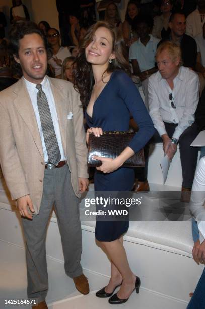 David Lauren and actress Emmy Rossum front row at Ralph Lauren\'s spring 2005 show in New York.