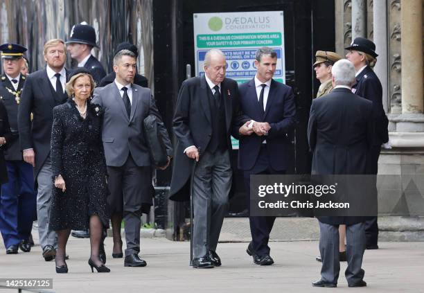 King Willem Alexander of The Netherlands, Sofía of Spain, and King Emeritus Juan-Carlos arrive at Westminster Abbey ahead of the State Funeral of...