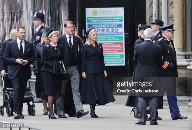 Queen Anne-Marie of Greece, Pavlos, Crown Prince of Greece and Marie-Chantal, Crown Princess of Greece arrive at Westminster Abbey for the State...