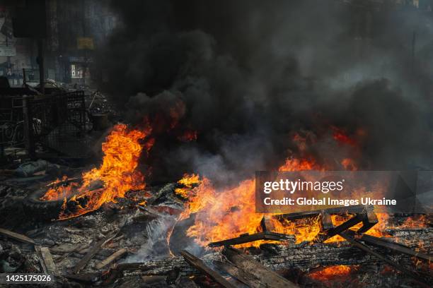 Barricades in flames during the Revolution of Dignity on Maidan Nezalezhnosti on February 19, 2014 in Kyiv, Ukraine. A wave of civil protests, known...