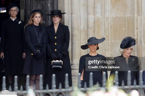 Birgitte, Duchess of Gloucester, Princess Beatrice, Princess Eugenie, Meghan, Duchess of Sussex and Camilla, Queen Consort are seen during The State...
