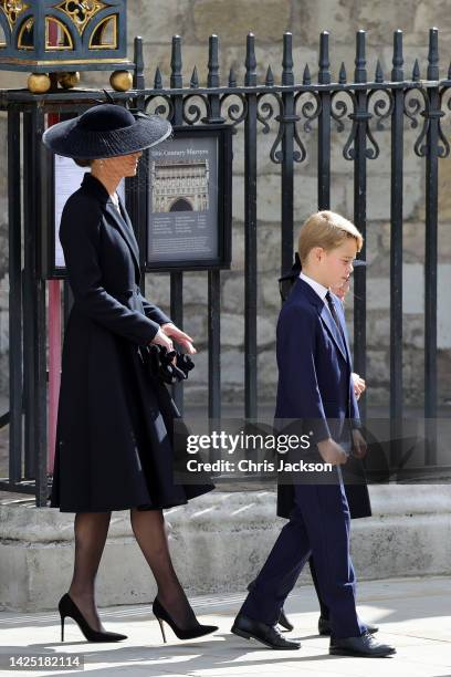 Catherine, Princess of Wales, Prince George of Wales leave Westminster Abbey during the State Funeral of Queen Elizabeth II on September 19, 2022 in...