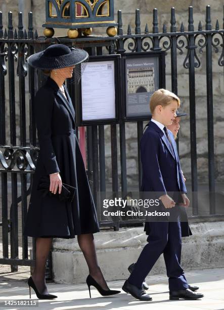 Catherine, Princess of Wales, Prince George of Wales leave Westminster Abbey during the State Funeral of Queen Elizabeth II on September 19, 2022 in...