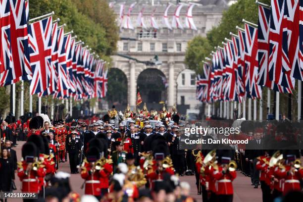 The Coldstream Guards travel along The Mall on September 19, 2022 in London, England. Elizabeth Alexandra Mary Windsor was born in Bruton Street,...