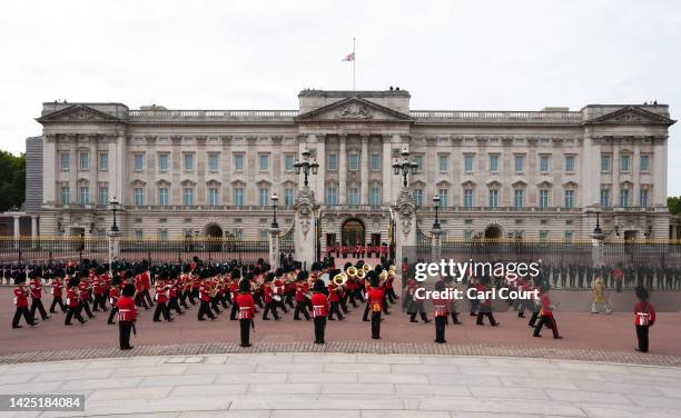 The Band of the Coldstream Guards pass by Buckingham Palace on September 19, 2022 in London, England. Elizabeth Alexandra Mary Windsor was born in...