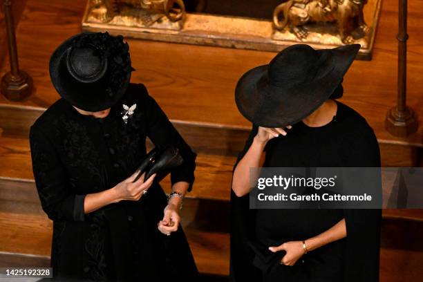 Sophie, Countess of Wessex and Meghan, Duchess of Sussex in Westminster Abbey during the State Funeral of Queen Elizabeth II on September 19, 2022 in...