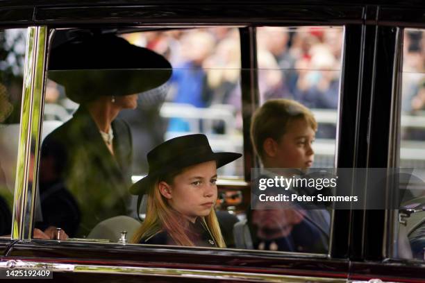 Catherine, Princess of Wales, Princess Charlotte of Wales and Prince George of Wales leaving Westminster Abbey during the State Funeral of Queen...