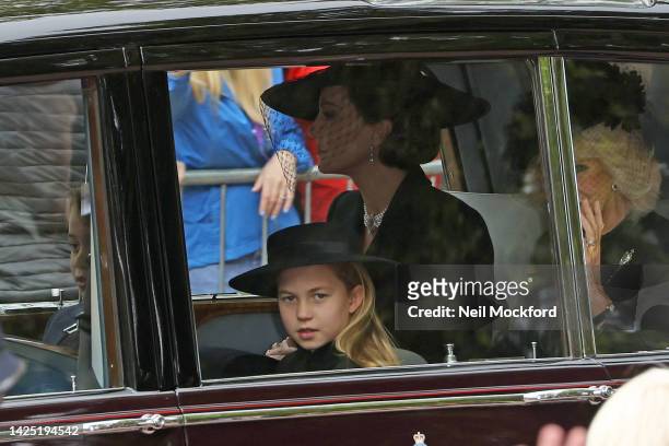 Catherine, Princess of Wales, Camilla, Queen Consort, Prince George of Wales and Princess Charlotte of Wales leave Clarence House to head to the...