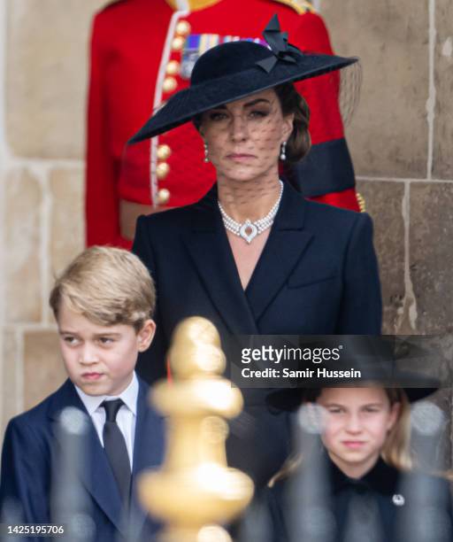 Prince George of Wales, Catherine, Princess of Wales, Princess Charlotte of Wales during the State Funeral of Queen Elizabeth II at Westminster Abbey...