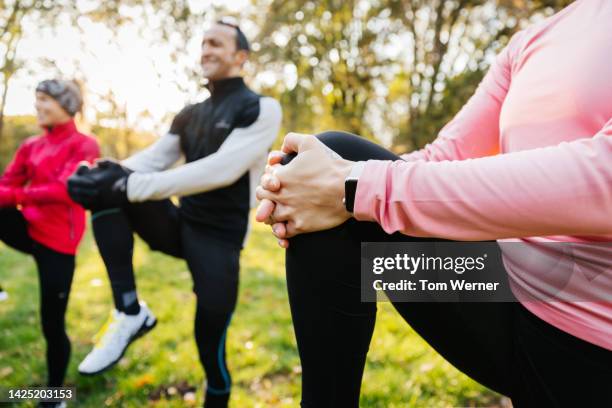 blurred image of people exercising - middle stock pictures, royalty-free photos & images