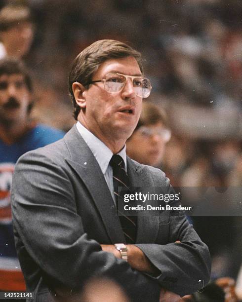 Head Coach Al Arbour of the New York Islanders follows the action from the bench Circa 1970 at the Montreal Forum in Montreal, Quebec, Canada.