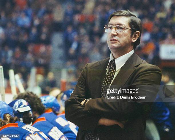 Head Coach Al Arbour of the New York Islanders follows the action from the bench Circa 1970 at the Montreal Forum in Montreal, Quebec, Canada.