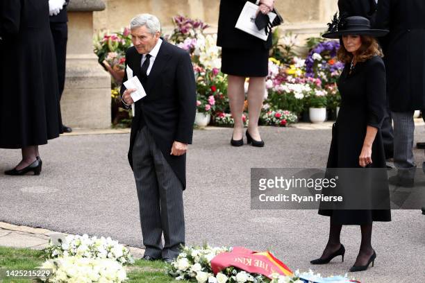 Michael Middleton and Carole Middleton arrive at Windsor Castle and pay their respects ahead of the Committal Service for Queen Elizabeth II on...