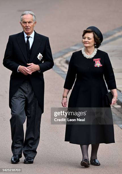 Former Prime Minister, Tony Blair and Cherie Blair arrive at The Committal Service for Queen Elizabeth II at Windsor Castle on September 19, 2022 in...