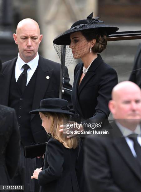 Catherine, Princess of Wales and Princess Charlotte of Wales arrive for the State Funeral of Queen Elizabeth II at Westminster Abbey on September 19,...