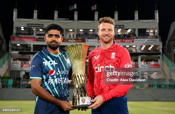 Pakistan Captain Babar Azam and England captain Jos Buttler pose with the Bank AlFalah Presents DafaNews Pakistan v England Series Trophy during a...