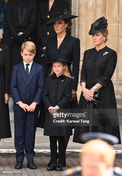 Prince George of Wales, Catherine, Princess of Wales, Princess Charlotte of Wales and Sophie, Countess of Wessex during the State Funeral of Queen...