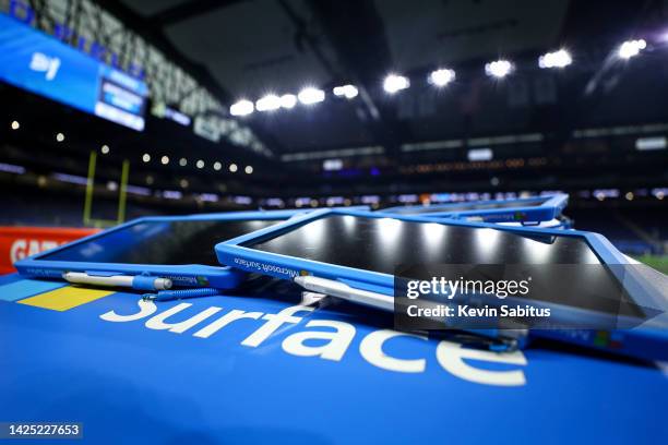 Microsoft Surface tablets on the sidelines prior to an NFL football game between the Washington Commanders and the Detroit Lions at Ford Field on...