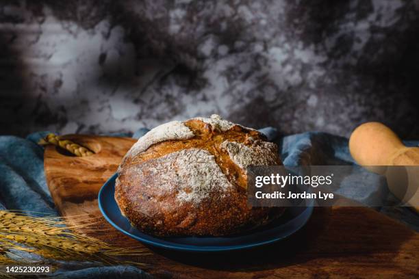 artisan sourdough bread still life - scoring bread stock pictures, royalty-free photos & images