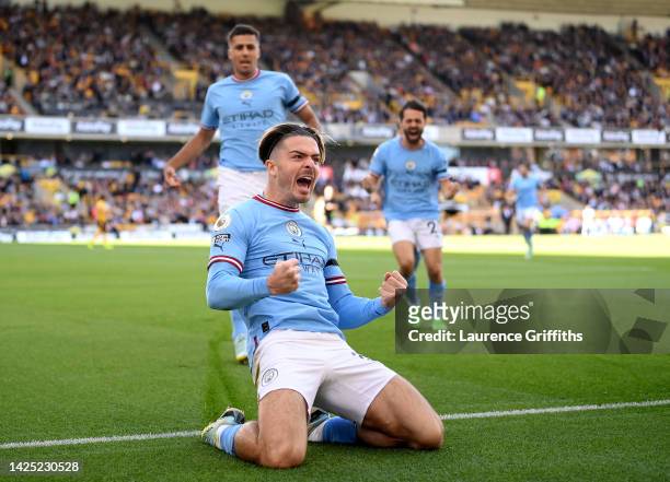 Jack Grealish of Manchester City celebrates scoring the first goal during the Premier League match between Wolverhampton Wanderers and Manchester...
