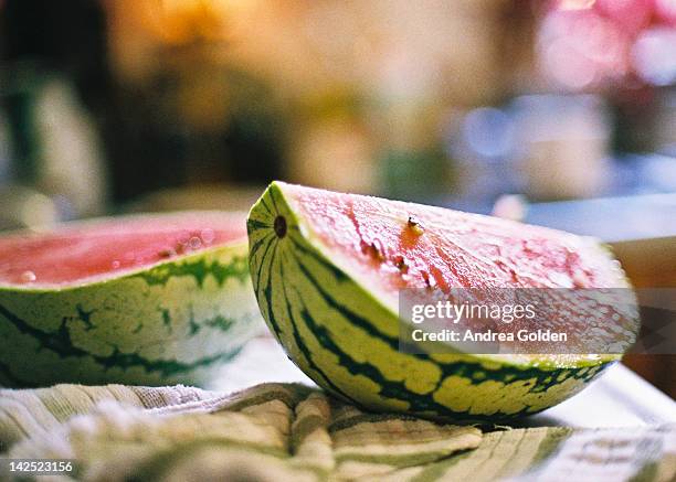 cut watermelon on kitchen counter - bloomington indiana stock pictures, royalty-free photos & images